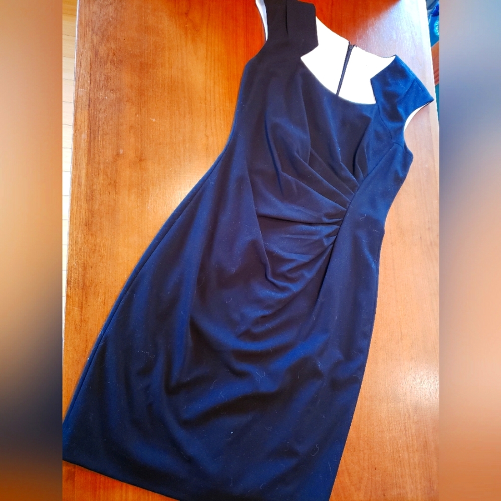 Black Calvin Klein sheath dress with cap sleeves and pretty neck cut detail